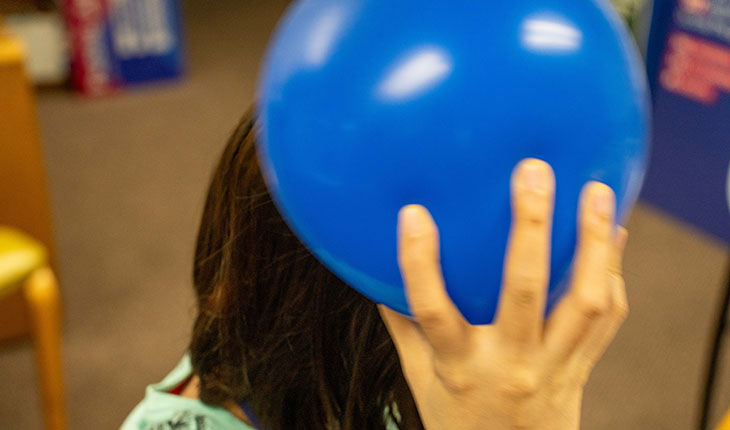 Rub a balloon with your hair